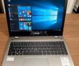 華碩筆記本電腦觸摸屏?xí)詣?dòng)點(diǎn)擊怎么解決