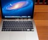 蘋果筆記本電腦觸摸屏?xí)詣狱c擊怎么解決